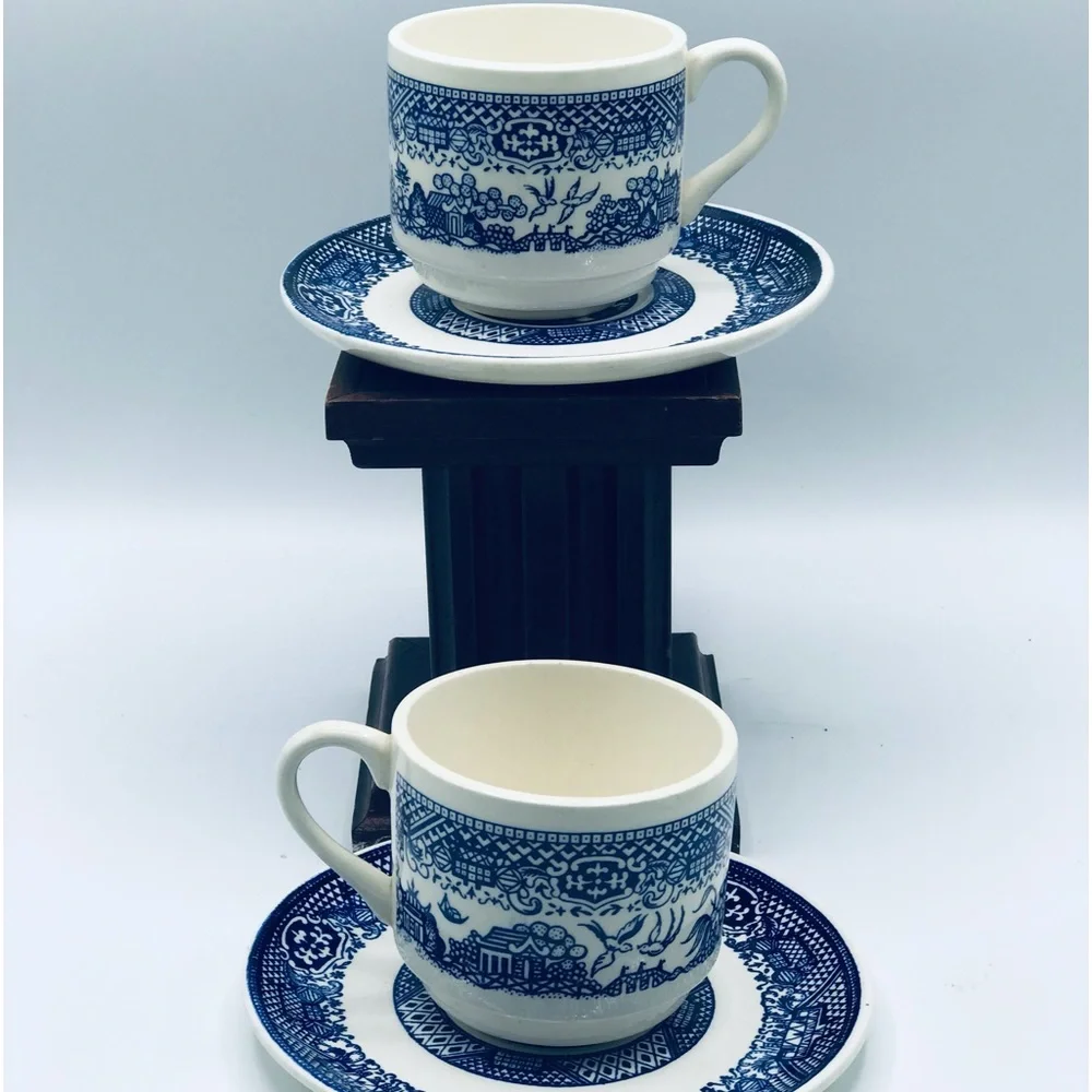 Vintage lot of 2 Blue Willow tea cup and saucer set. Marked U.S.A.